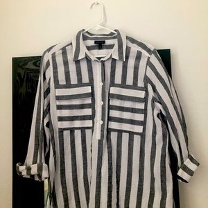 Black and white striped blouse in cotton.